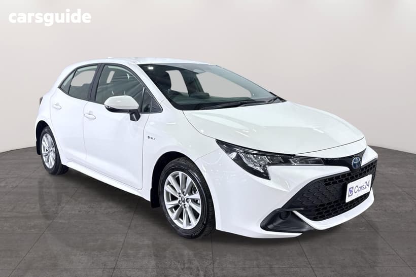 White 2024 Toyota Corolla Hatchback Ascent Sport + Conv Pk Hybrid