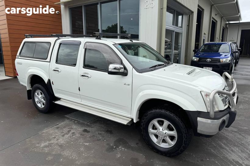 White 2009 Isuzu D-MAX Crew Cab Utility Ls-U (4X4)