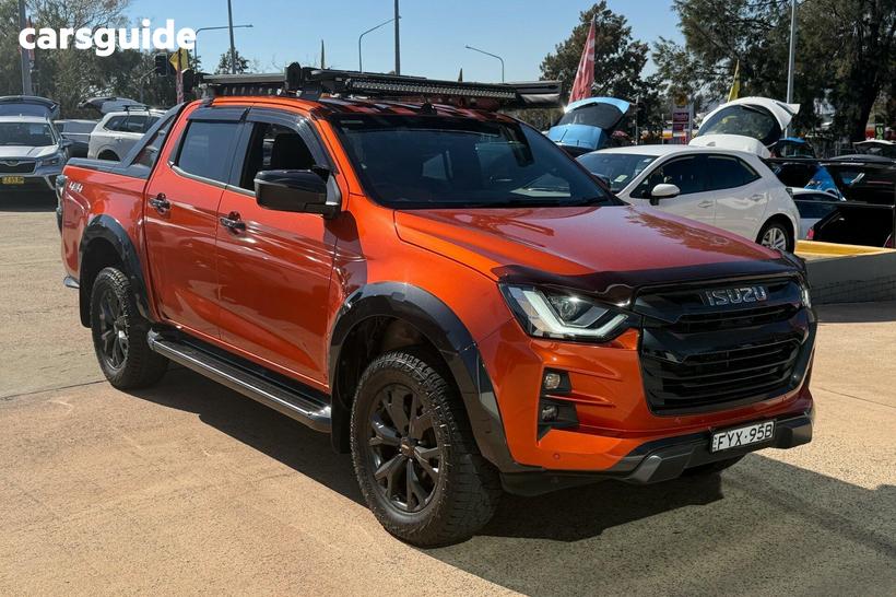 Orange 2023 Isuzu D-MAX Crew Cab Utility X-Terrain (4X4)