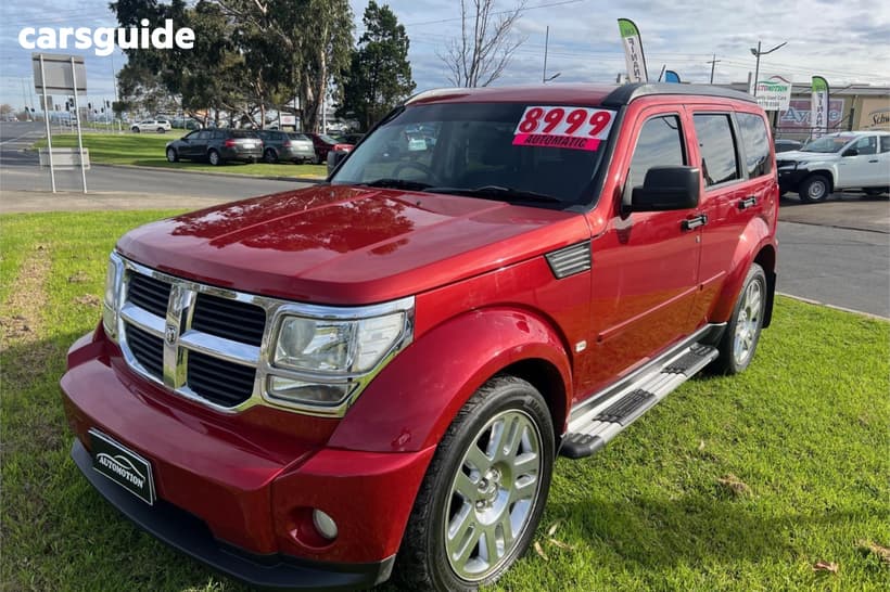 Red 2010 Dodge Nitro Wagon Sx