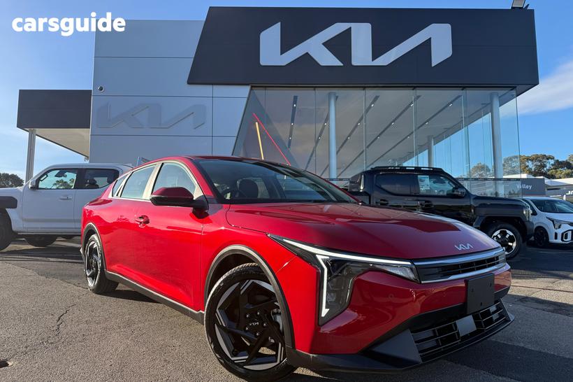 Red 2025 Kia K4 Sedan Sport+