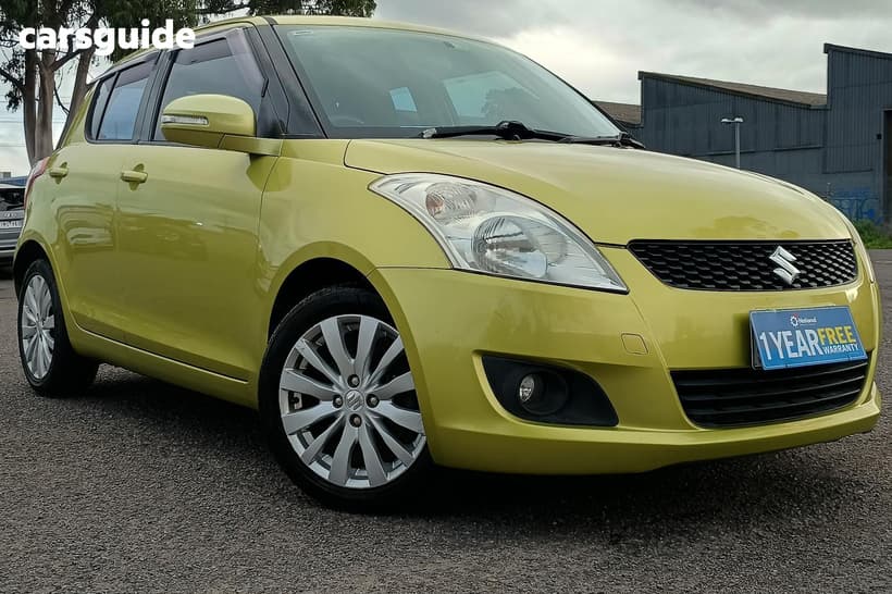 Yellow 2013 Suzuki Swift Hatchback Glx