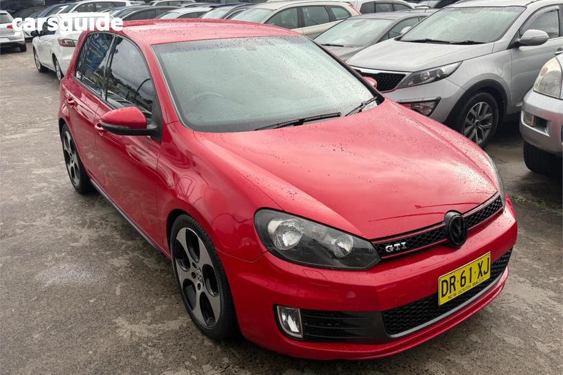 Red 2010 Volkswagen Golf Hatchback Gti