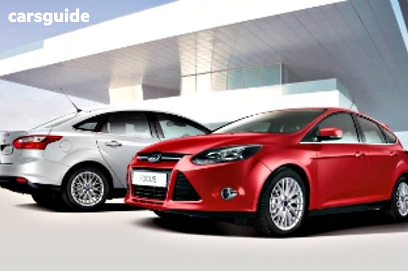 Red 2012 Ford Focus Hatchback Sport