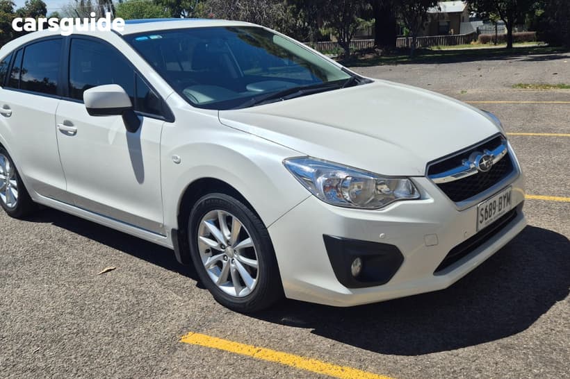 White 2014 Subaru Impreza Hatchback 2.0I-L (Awd)