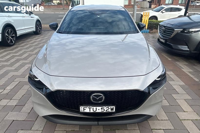 Beige 2025 Mazda 3 Hatchback G25 Evolve Sp Vision