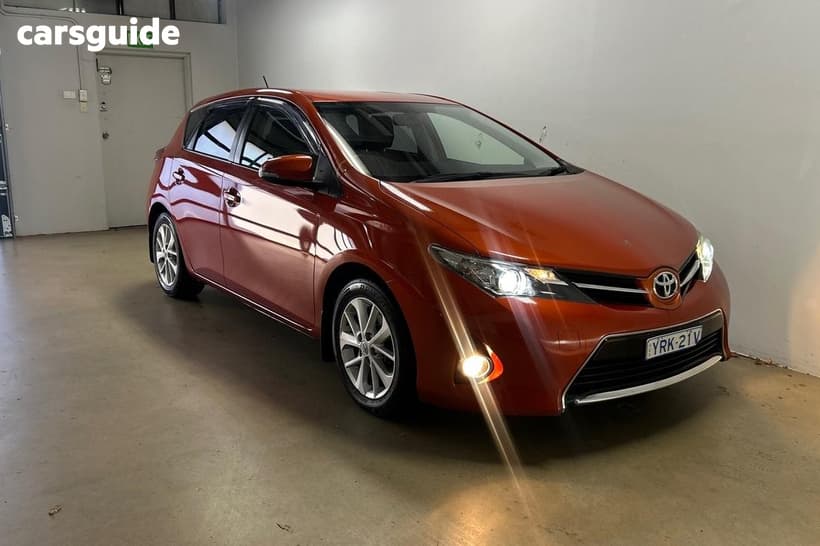 Orange 2013 Toyota Corolla Hatchback Ascent Sport