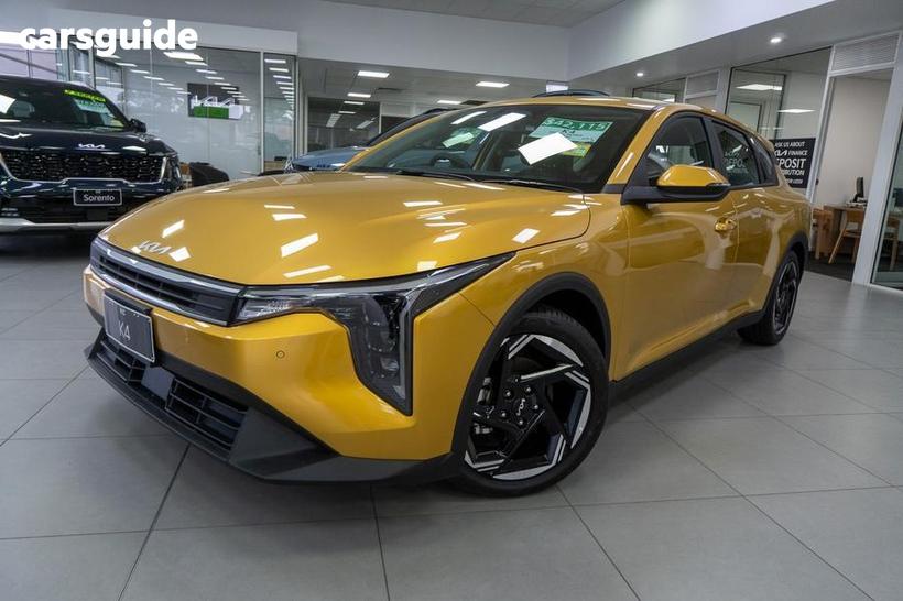 Yellow 2026 Kia K4 Hatchback Sport+