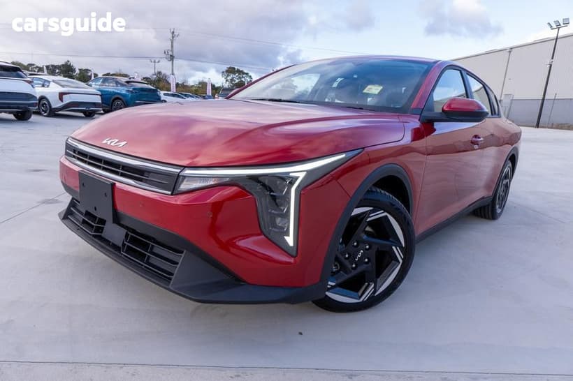 Red 2025 Kia K4 Sedan Sport