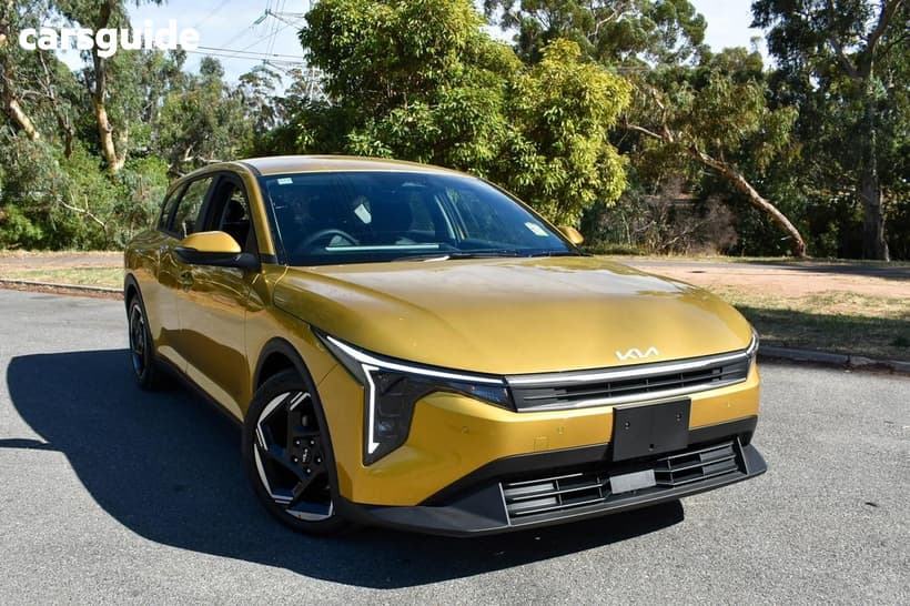 Yellow 2025 Kia K4 Hatchback Sport+