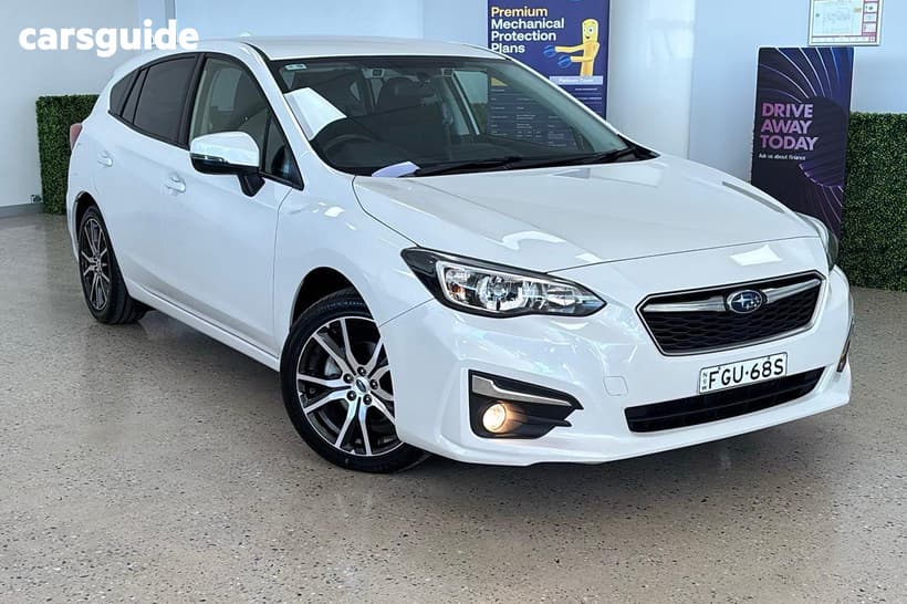 White 2017 Subaru Impreza Hatchback 2.0L (Awd)