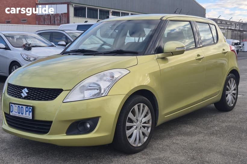 Yellow 2013 Suzuki Swift Hatchback Glx