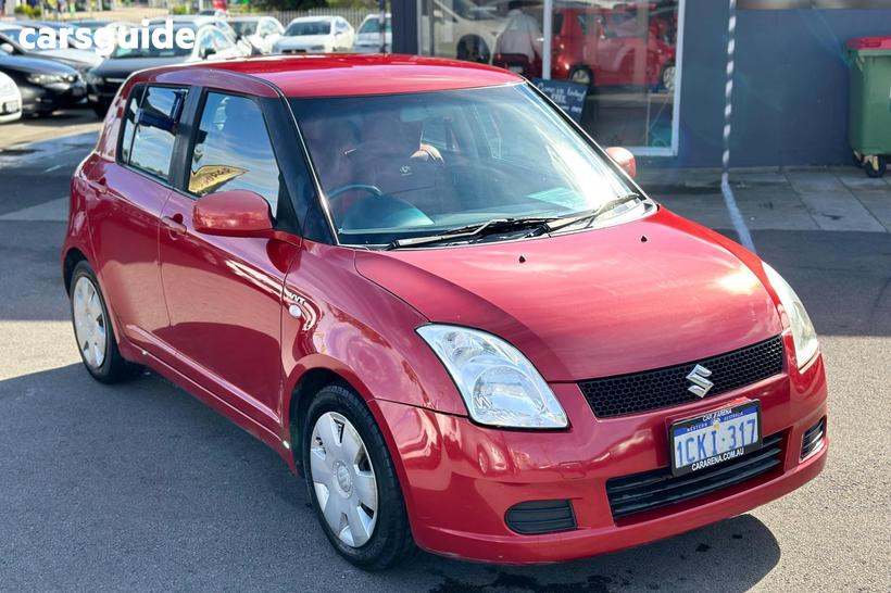 Red 2005 Suzuki Swift Hatchback