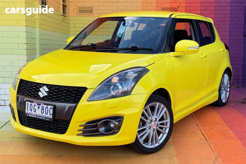 Yellow 2016 Suzuki Swift Hatchback Sport Navigator