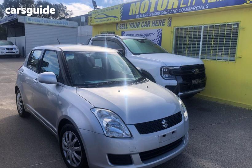 Silver 2010 Suzuki Swift Hatch