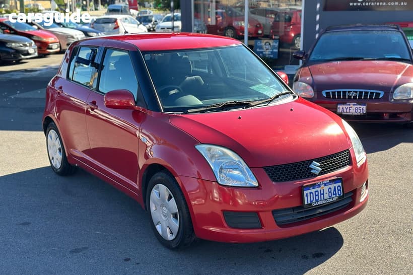 Red 2009 Suzuki Swift Hatchback