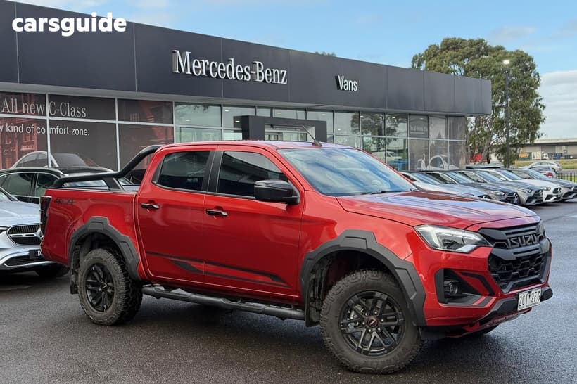 Orange 2024 Isuzu D-MAX Crew Cab Utility Blade