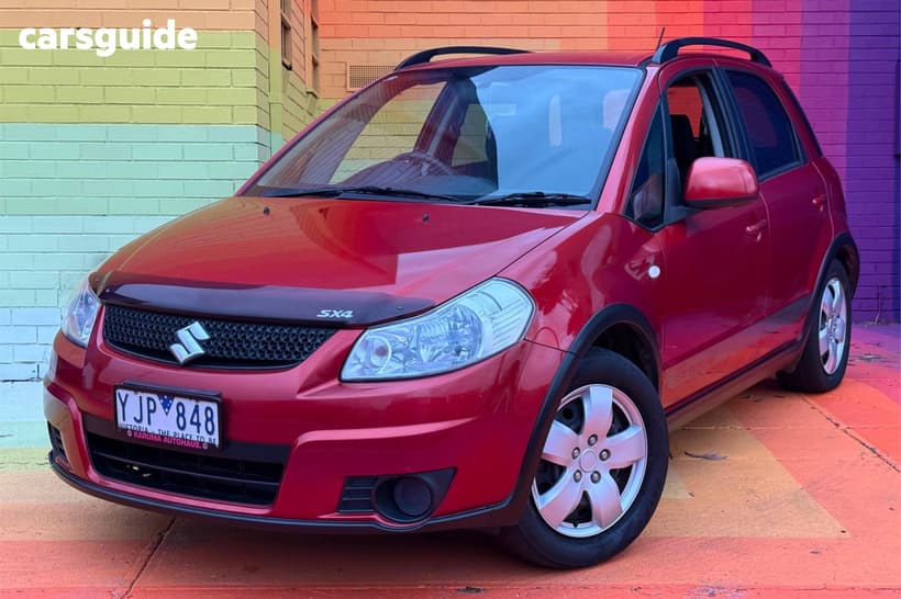 Orange 2011 Suzuki SX4 Hatchback Awd