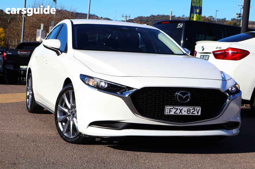 White 2024 Mazda 3 Sedan G20 Evolve