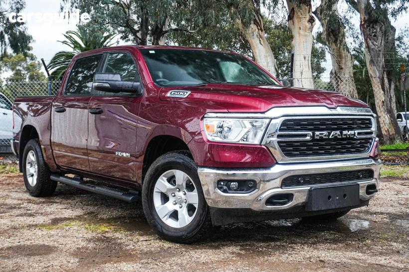 Red 2023 RAM 1500 Crew Cab Utility Big Horn (6-4 Tub) Mhev (4X4)