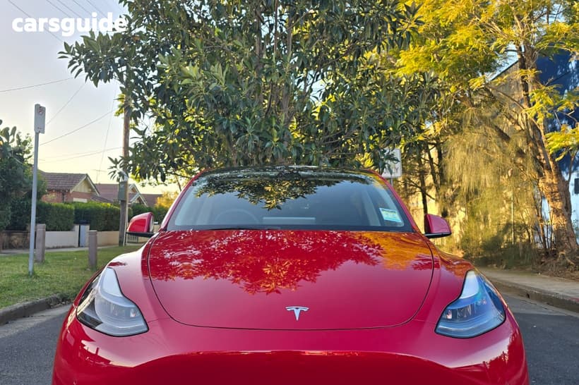 Red 2023 Tesla Model Y Wagon Long Range