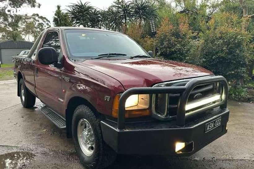 Red 2003 Ford F250 Super Cab Pickup Xlt