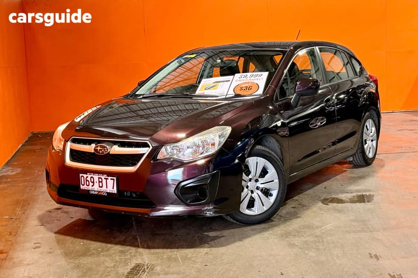 Purple 2013 Subaru Impreza Hatchback 2.0I-L (Awd)