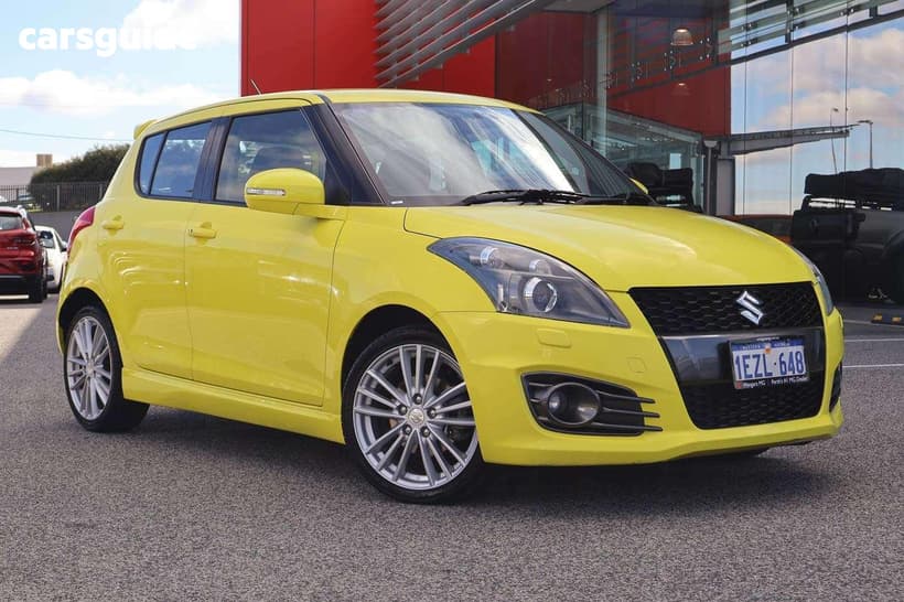 Yellow 2016 Suzuki Swift Hatchback Sport Navigator
