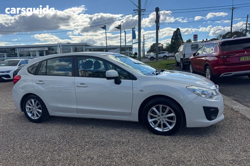 White 2014 Subaru Impreza Hatchback 2.0I (Awd)