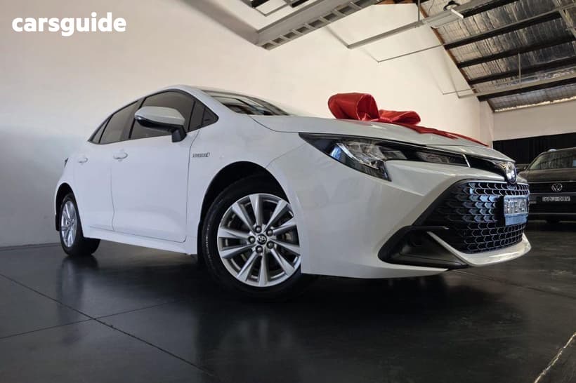 White 2023 Toyota Corolla Hatchback Ascent Sport Hybrid