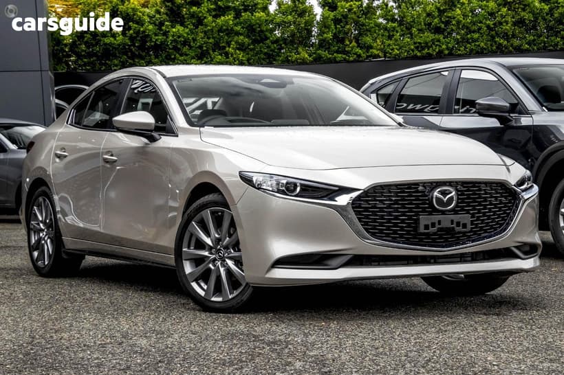 Beige 2026 Mazda Mazda3 Hatchback G20 Evolve