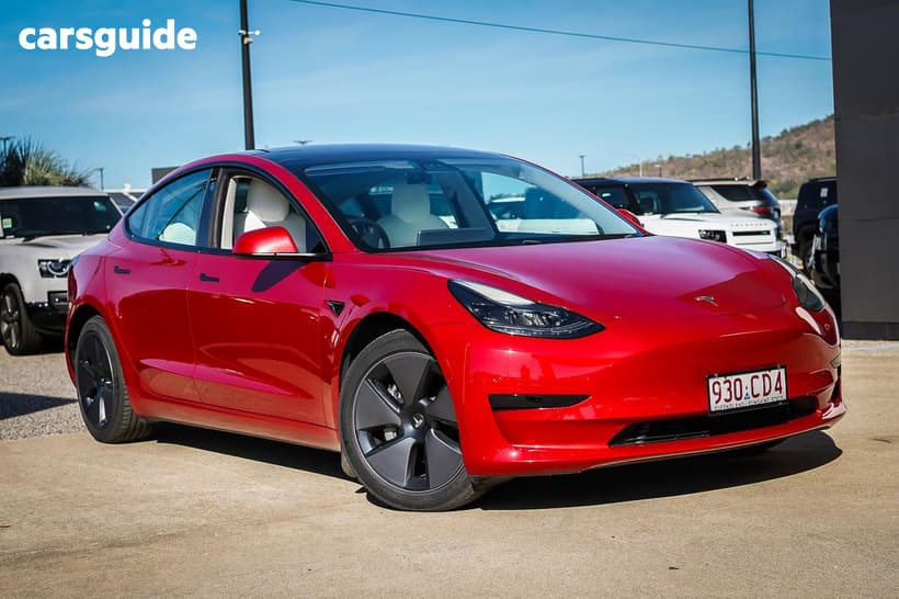 Red 2021 Tesla Model 3 Sedan Standard Range Plus Rwd