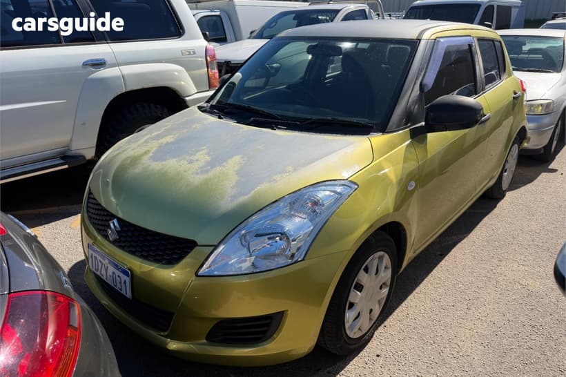 Yellow 2012 Suzuki Swift Hatchback Ga