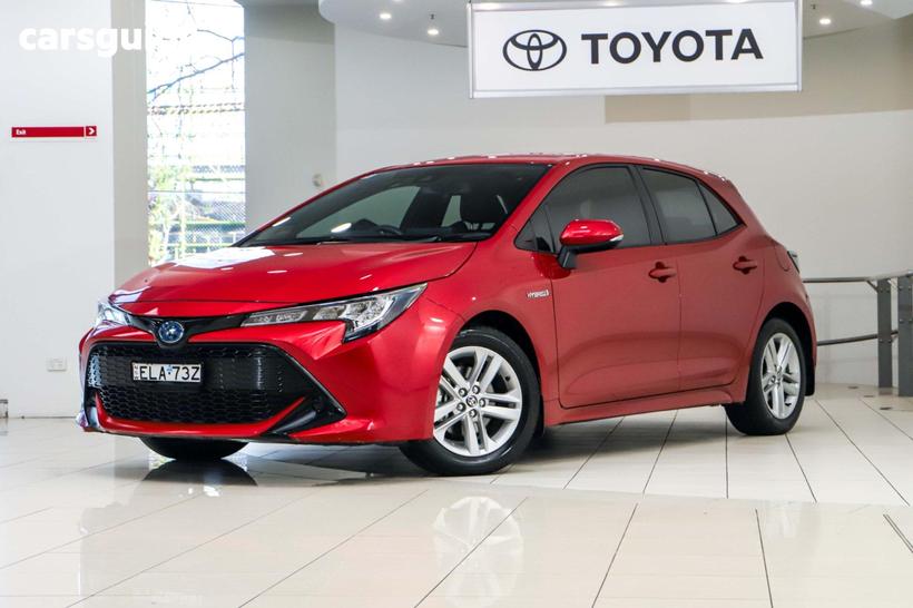 Red 2020 Toyota Corolla Hatchback Ascent Sport (Hybrid)