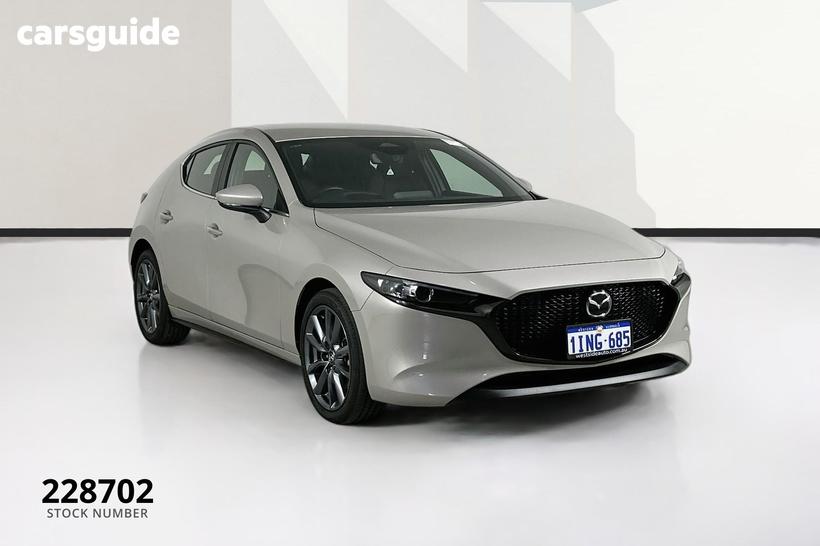 Gold 2024 Mazda 3 Hatchback G20 Evolve