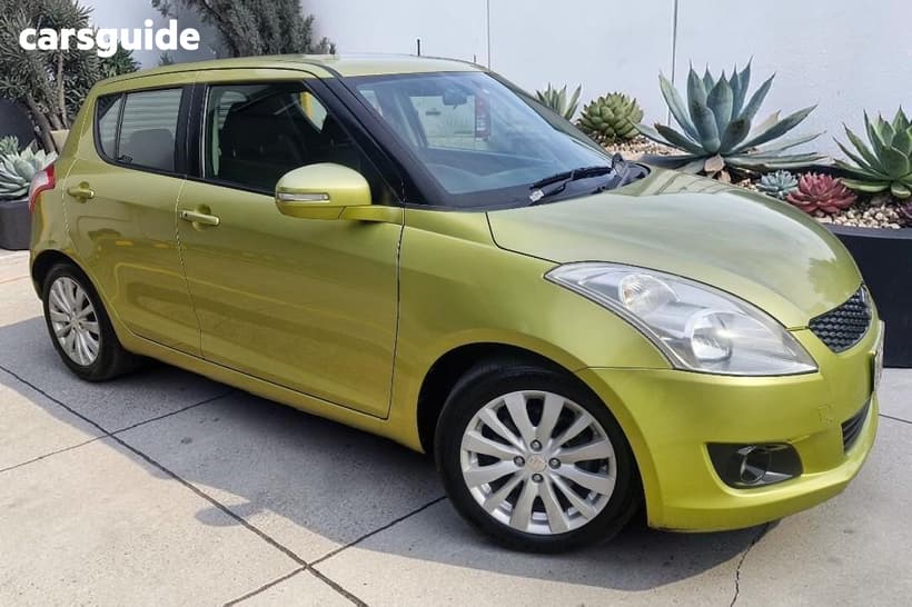 Yellow 2013 Suzuki Swift Hatchback Glx
