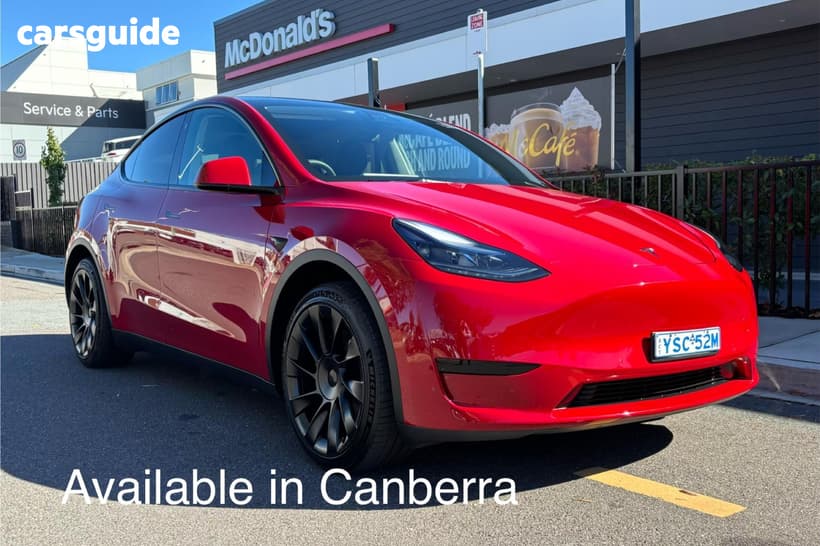 Red 2022 Tesla Model Y Wagon Rear-Wheel Drive