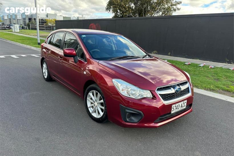 Red 2013 Subaru Impreza Hatchback 2.0I (Awd)