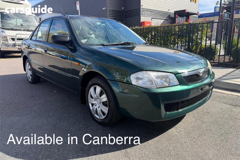 Green 1998 Mazda 323 Sedan Protege