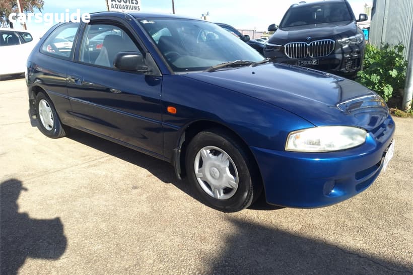 Blue 2003 Mitsubishi Mirage Hatchback