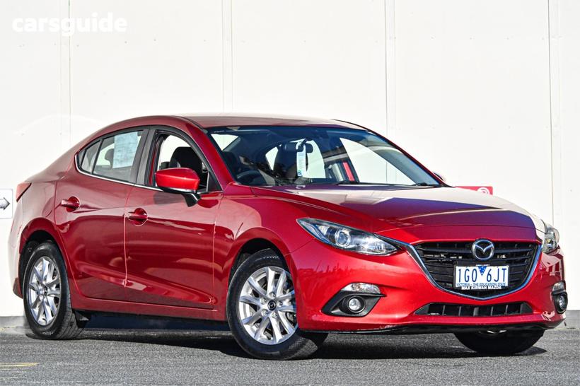 Red 2015 Mazda 3 Sedan Touring