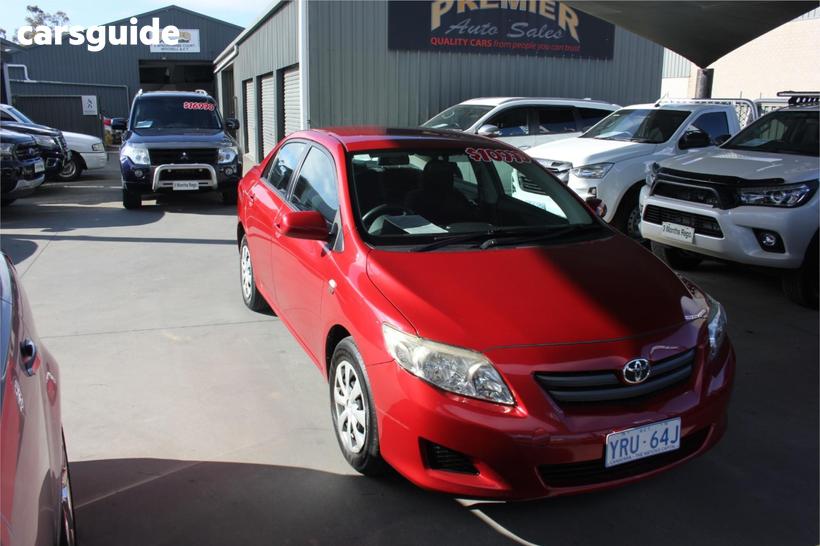 Red 2008 Toyota Corolla Sedan Ascent
