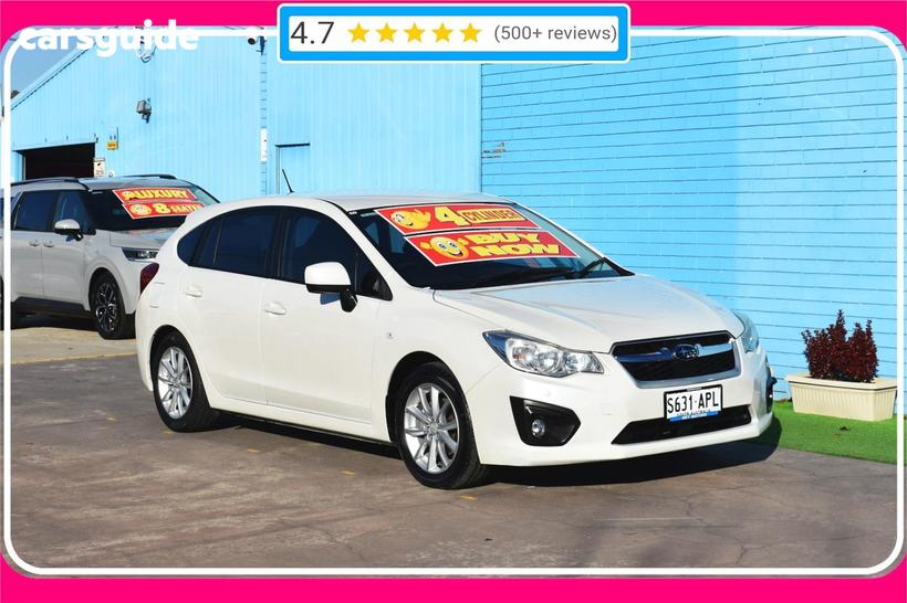White 2012 Subaru Impreza Hatchback 2.0I-L (Awd)