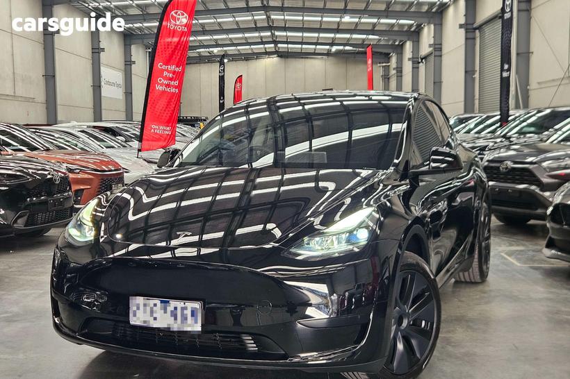 Black 2025 Tesla Model Y Wagon Rear-Wheel Drive