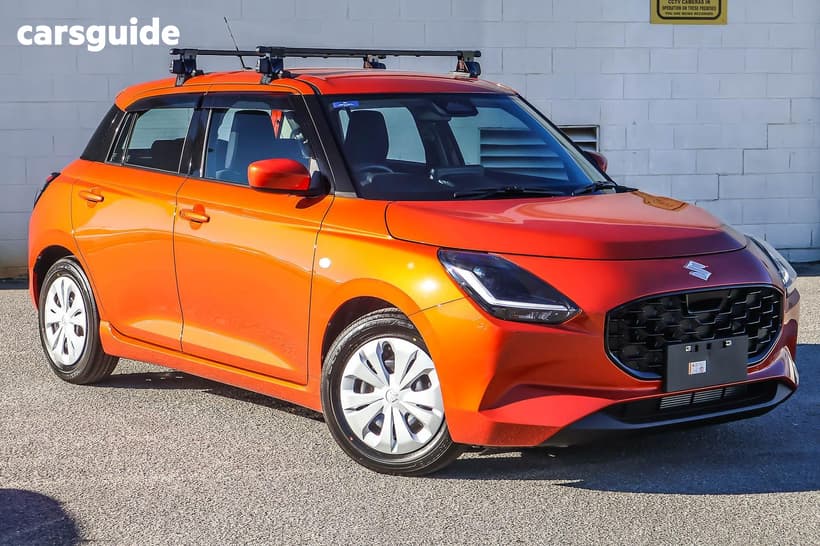 Orange 2026 Suzuki Swift Hatchback Hybrid