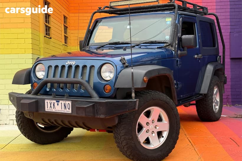 Blue 2010 Jeep Wrangler Softtop Sport (4X4)