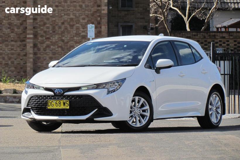 White 2023 Toyota Corolla Hatchback Ascent Sport Hybrid