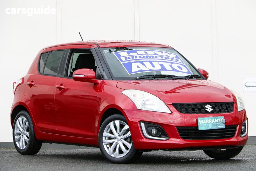 Red 2015 Suzuki Swift Hatchback Gl Navigator