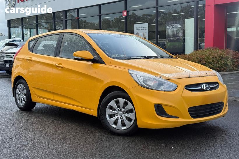Yellow 2016 Hyundai Accent Hatchback Sr