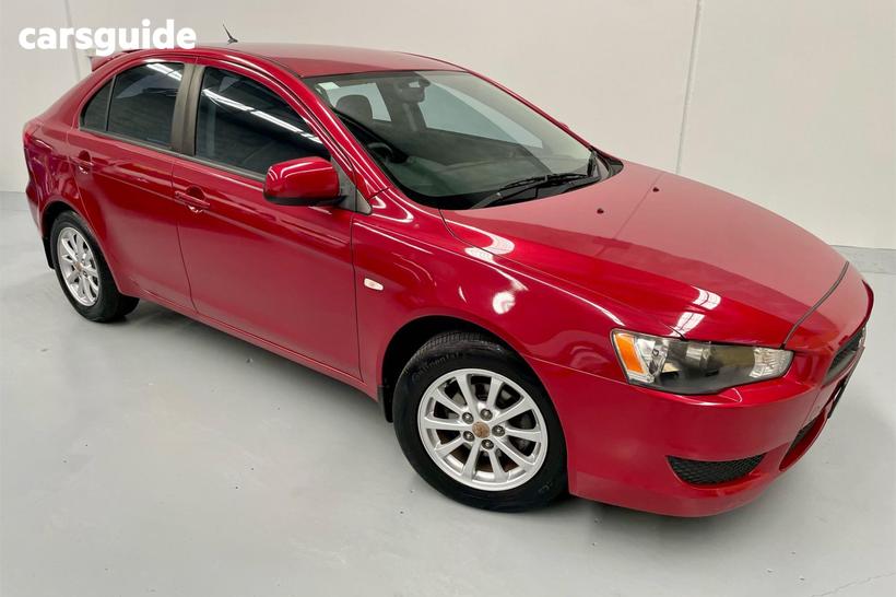 Red 2010 Mitsubishi Lancer Sedan Sx